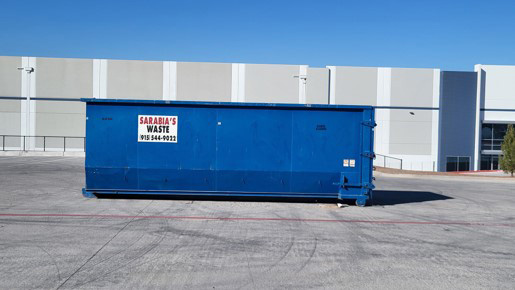 A blue Sarabia’s roll-off container in El Paso.